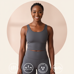 Circular portrait of Amara Okafor, a confident woman with an athletic build, smiling and wearing charcoal activewear.